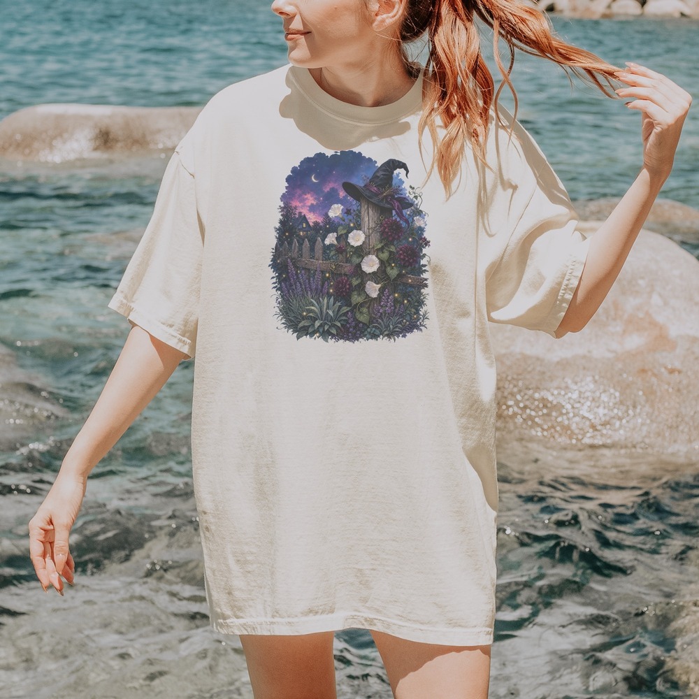 Witch Hat Resting on Garden Fence Under the Crescent Moon Tee
